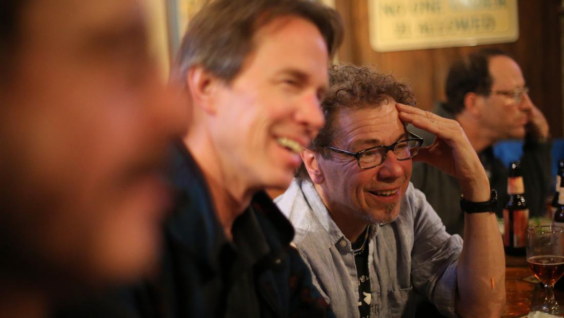 After dinner and drinks, Bo Emerson (from left), Don Hopey and Scott Huler study maps and try to decide where on the Appalachian Trail to hike during the Appalachian Adventure reunion. Ben Gray / bgray@ajc.com
