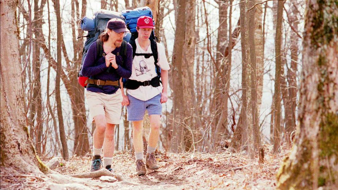John Harmon (left) and Bo Emerson walk up the trail towards their destination before setting up camp on the 1995 hike. Photo: David Tulis