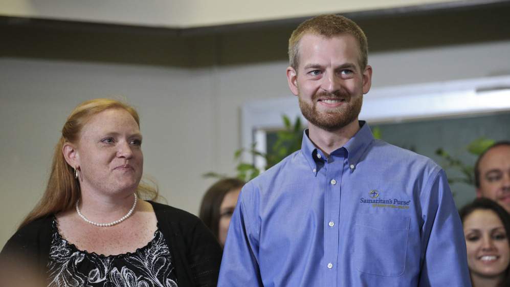 Amber and Kent Brantly at a news conference after he was released from Emory University Hospital last August. John Spink, jspink@ajc.com