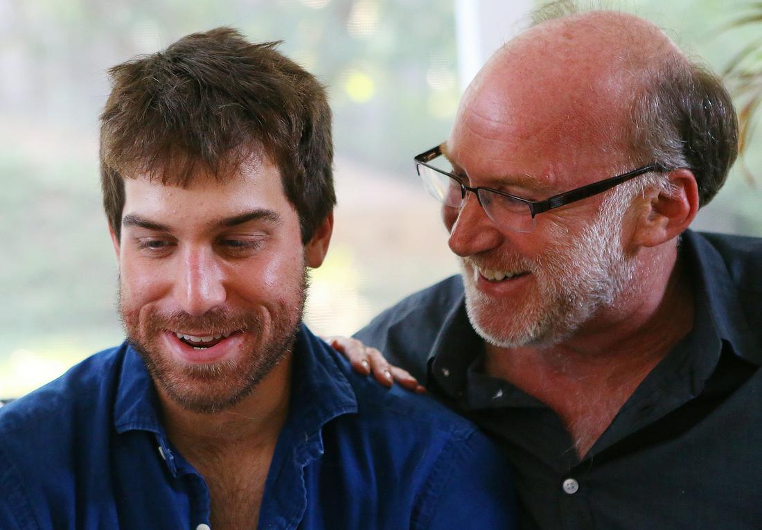 Jeff and Josh at the family home in Johns Creek. Photo: Curtis Compton / ccompton@ajc.com